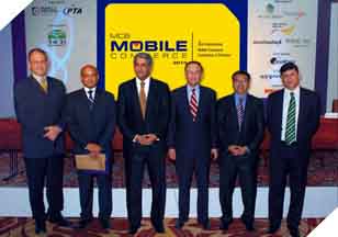 Mr. Imran Qurashi (President Access Group), Mr. Hannes Van Rensburg (CEO Fundamo) & Mr. Faisal Rahem (Total Combination) with Attendees at the 3rd international Mobile Commerce Conference.